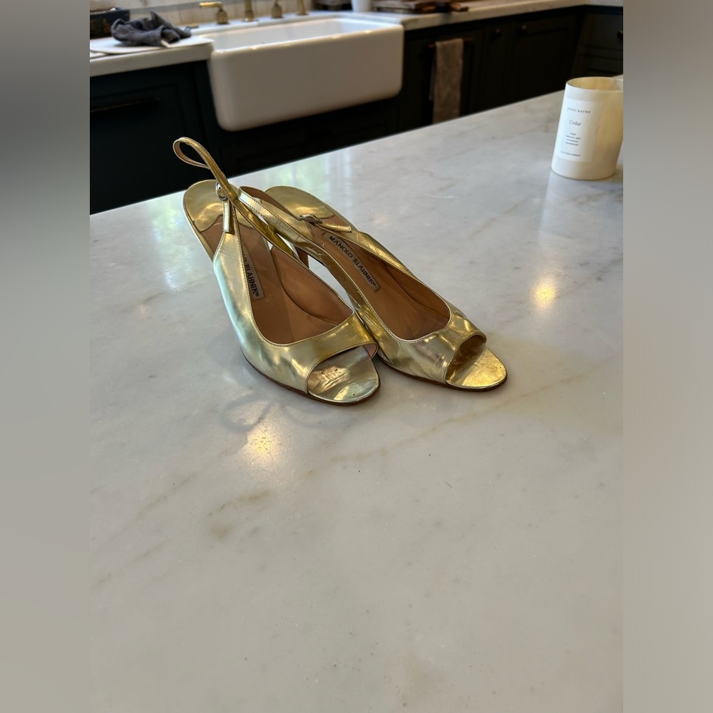 Manolos - gold sling back heal 3 inch. Good condition - worn Size 38.5